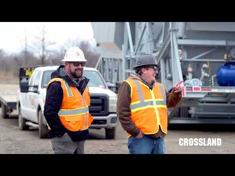 Creative124 company event coverage showing two people in orange safety vests